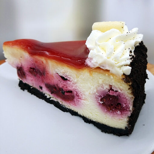 White Chocolate Raspberry Cheesecake - Slice